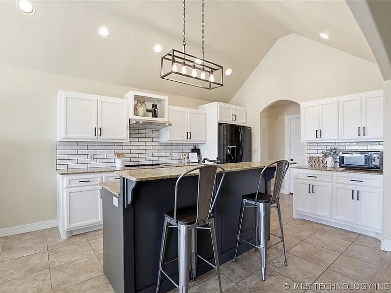Refinished kitchen cabinets by Premier