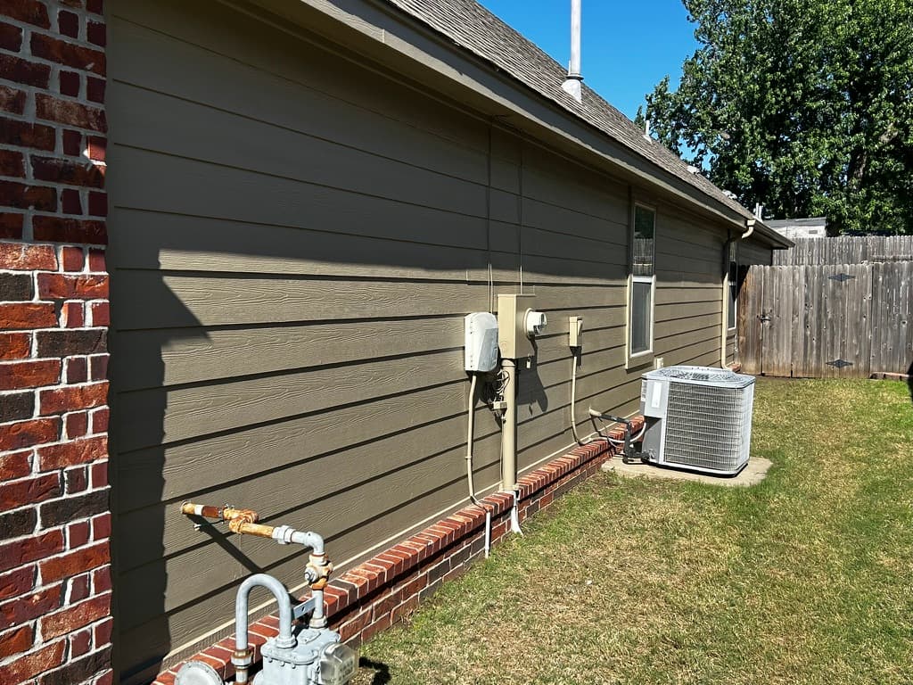 Home exterior with a darker siding color